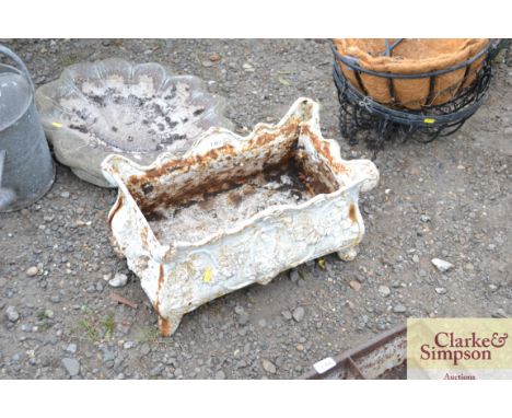 A cast iron white painted planter