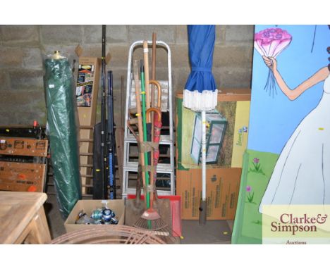 An aluminium step ladder and a bundle garden tools
