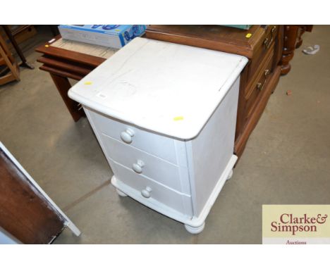 A light grey painted three drawer pine chest