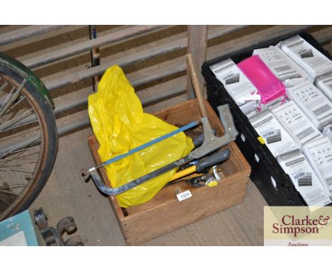 A box containing various hand tools