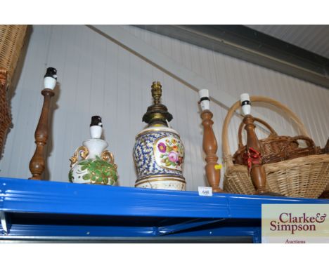 Three wooden turned table lamps; and a Brevetee table lamp and one other AF
