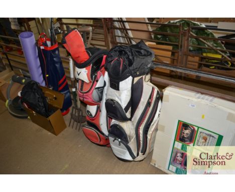 A Callaway caddy bag together with a Wilson Staff caddy bag
