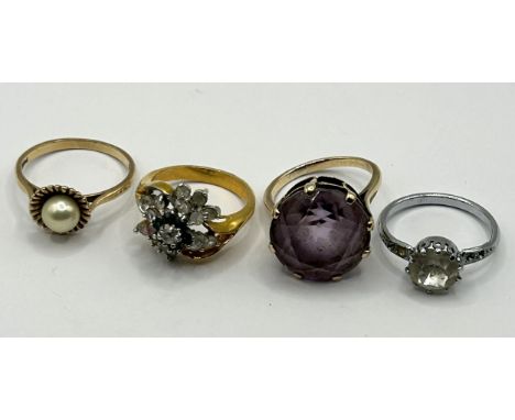 A 9ct gold and pearl ring, ring size R, and three other rings (4)