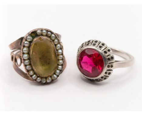 An antique yellow stone and seed pearl ring, ring size N and a red paste ring (2)