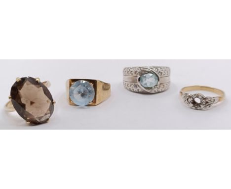 A 9ct gold smokey quartz ring, ring size P, and three other rings (4)