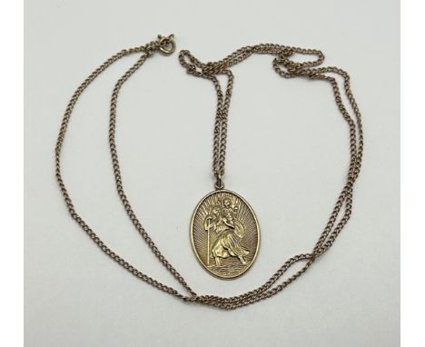 A 9ct gold St Christopher, on a 9ct gold chain, 8.8 g