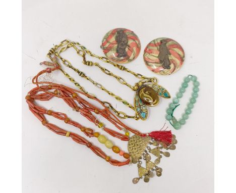 A mid 20th century bakelite and bronze buckle, decorated figures, and assorted jewellery