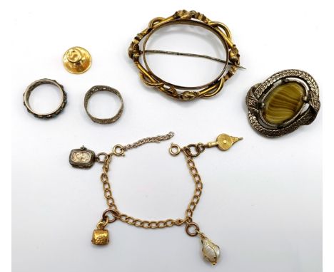 A yellow metal brooch frame, a yellow metal charm bracelet, and assorted other jewellery (6)