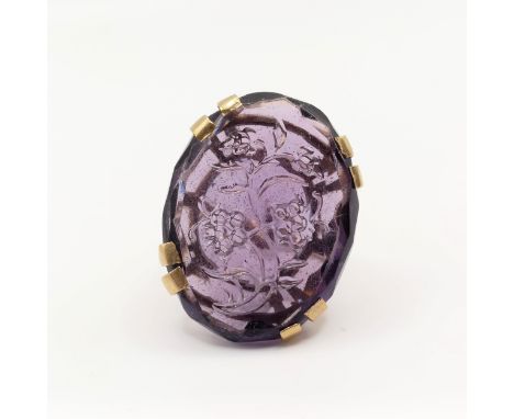 A large 9ct gold and intaglio amethyst ring, carved flowers