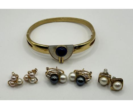 A gold plated bangle, and various earrings