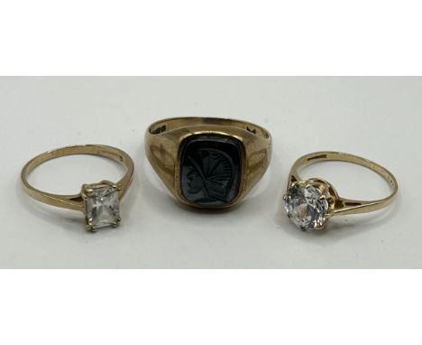 A 9ct gold signet ring and two 9ct gold and paste set rings (3)8.7 g all in