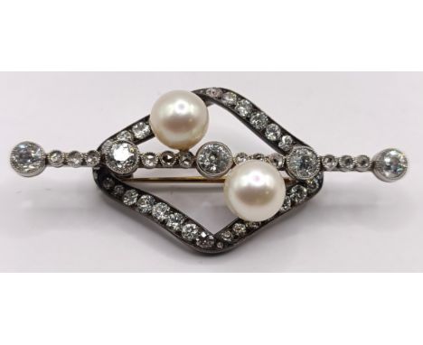 An early 20th century diamond and cultured pearl brooch, 55 mm wide approx