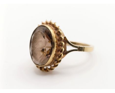 A 9ct gold and citrine ring, ring size P