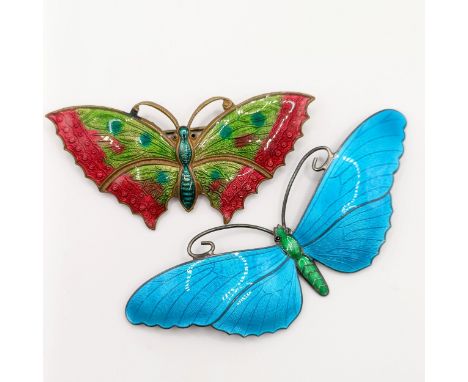 A silver and enamel butterfly brooch, 80 mm wide, and a gilt metal and enamel butterfly brooch, 60 mm wide (2)