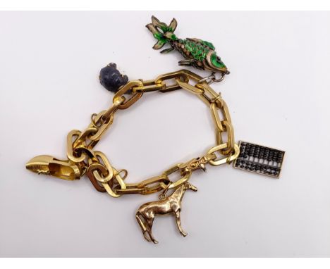 A 9ct gold bracelet, with assorted gold and enamel charms, 39.7 g (all in)