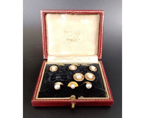 A 9ct gold and cultured pearl dress set, comprising three large buttons, three small buttons and one cufflink, in a vintage j