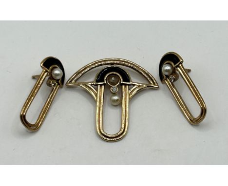 A yellow metal, diamond, pearl and black enamel pendant and a pair of matching earrings (2)