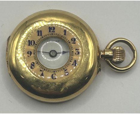 A ladies 18ct gold half hunter fob watch, with enamel decoration, 25.0 g (all in)