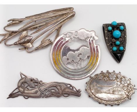 A silver and enamel brooch, three silver coloured metal brooches, and a silver coloured metal and turquoise clip (5)