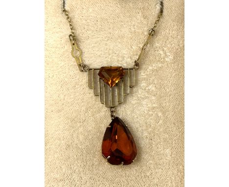 An Art Deco style 9ct gold and amber stone necklace, cased, retail mark for Fish Bros, London
