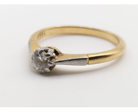 An 18ct gold and diamond solitaire ring, 0.2ct approx., ring size P