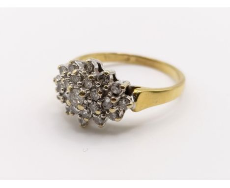 An 18ct gold and diamond cluster ring, ring size L, 3.7 g (all in)