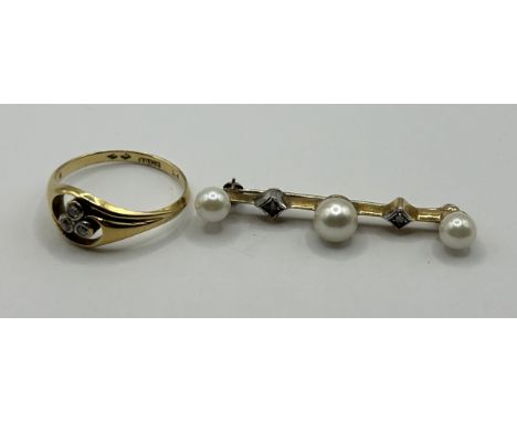 An 18ct gold and diamond ring, ring size N, and a 9ct gold, seed pearl and diamond chip bar brooch (2)