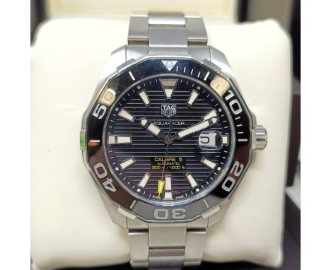 A gentleman's stainless steel Tag Heuer Aquaracer Calibre 5 wristwatch, boxed, with spare links and instructions