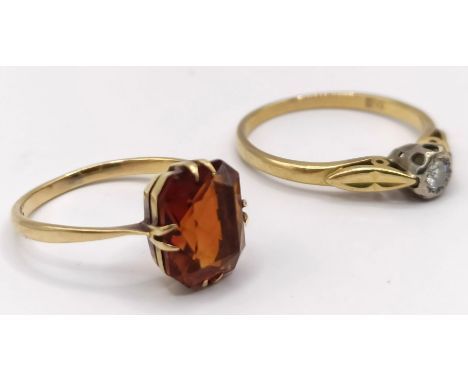A 9ct gold and diamond solitaire ring, and another ring (2)