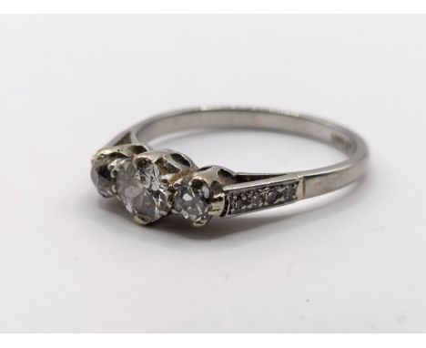 A platinum and diamond three stone ring, ring size N