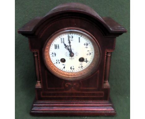 Japy Freres Edwardian mahogany inlaid mantle clock with circular enamelled dial. Approx. 25cms H
used not tested crack to fro