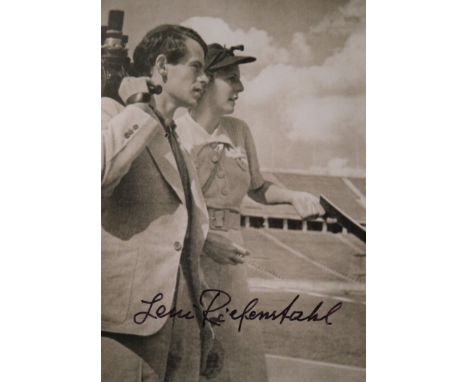 RIEFENSTAHL LENI: (1902-2003) German Film Director. Three signed 4 x 6 sepia photographs, the first depicting Riefenstahl wit
