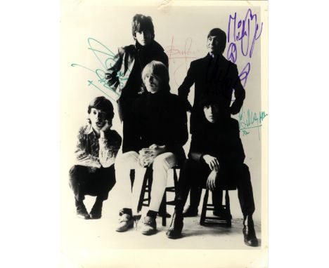 ROLLING STONES THE: A good vintage signed 8 x 10 photograph by all five original members of the English Rock 'n' Roll band in