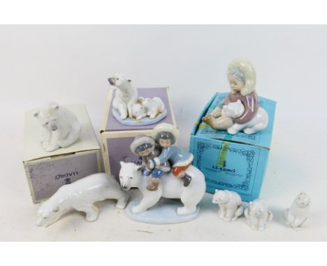 Lladro / Nao - A collection of polar bear figures / groups to include # 5434 Polar Bear Miniature (boxed), # 1209 (boxed), # 