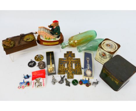 A lot of small collectables to include two 19th century Wovenden, Sale glass apothecary bottles, pin badges, silver vesta cas