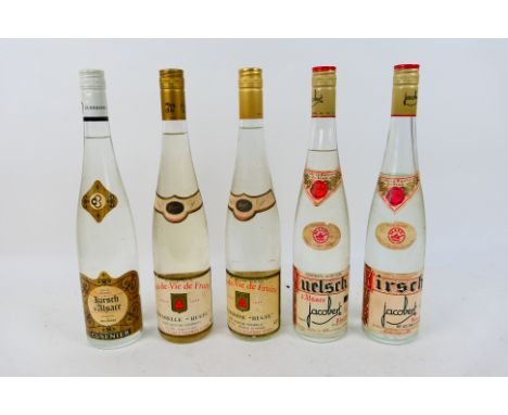 Five vintage bottles of Eau de Vie or fruit spirit comprising three Kirsch, 24 fl ozs and 70° Proof, Hugel Framboise (raspber