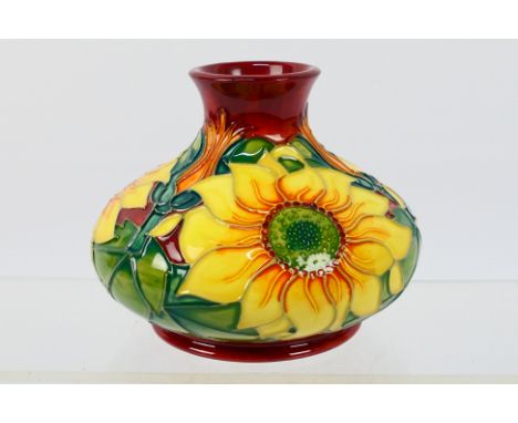 Moorcroft - A Moorcroft Pottery vase of squat form, 1995, decorated in the Inca Sunflower pattern, impressed marks and WM mon