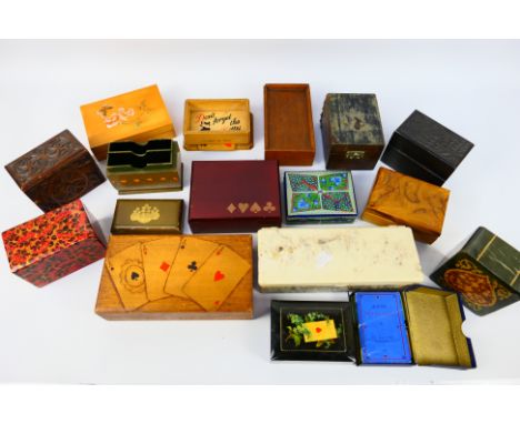A quantity of playing card and similar boxes. [W]