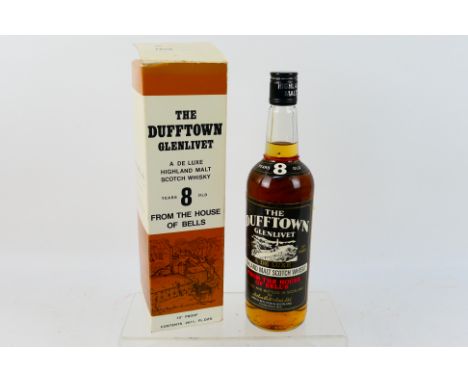 A 1970's bottling of Dufftown Glenlivet 8 Year Old, 26⅓ fl ozs, 70° proof, contained in presentation box (seam split on box),