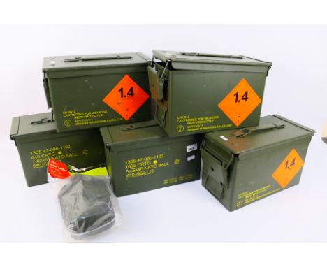 Five metal NATO ammunition boxes marked 1000 CRTG, 4 at 4.56 x 45 NATO BALL, 1 at 7.62 x 51 NATO BALL and a replica American 