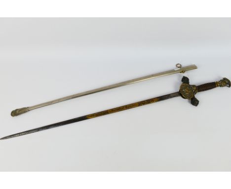 A late 19th or early 20th century American (US) Knights Of Pythias ceremonial sword, parcel gilt (71 cm length) blade etched 