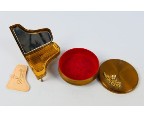 A vintage Pygmalion Sonata powder compact in the form of a piano and a trinket box. [W]