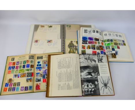 Philately - Two albums of UK and world stamps, a binder containing first day covers and PHQ cards and a 1962 edition of the G