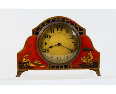 An early 20th century Asprey of London chinoiserie mantel clock, Arabic numerals to a white dial, 13 cm (h). [W]