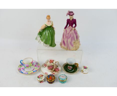 Lot to include a Coalport figure from the Age Of Elegance collection, Hyde Park, a Royal Doulton figure # HN2193, Fair Lady, 