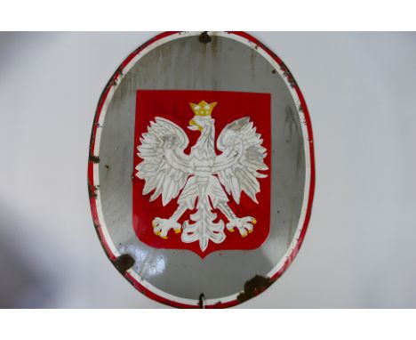 Polish enamel sign c. 1930, of oval form, enamelled in red, grey, white and yellow with crowned heraldic eagle, designed by Z