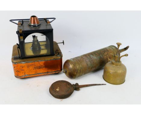 A BR(M) signal lamp interior with square section copper reservoir, fire extinguisher and other.