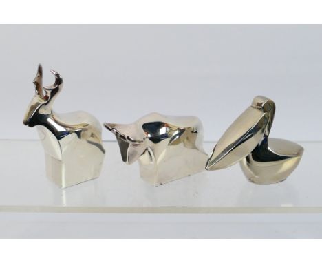 Three Dansk International Designs silver plated paperweights in the form of stylised animals comprising moose, bull and pelic