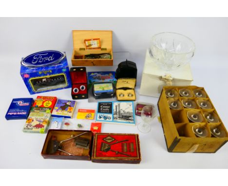 Lot to include glassware, vintage hair clippers, 8mm film reels, scales, cufflinks and other. [W]