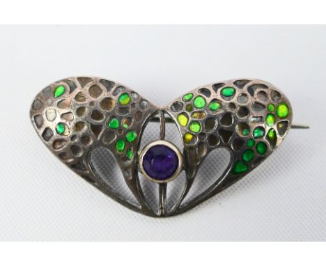 An Art Nouveau silver and enamel brooch by Charles Horner (losses to the enamel), Chester assay 1908, approximately 3 cm (l).